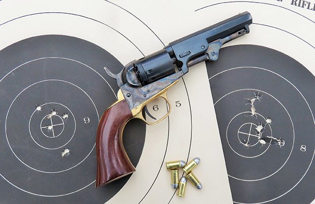 The five-shot group is on the left, a 10-shot group is on the right both fired with the 32 S&W cartridge in the 1848 Pocket revolver.